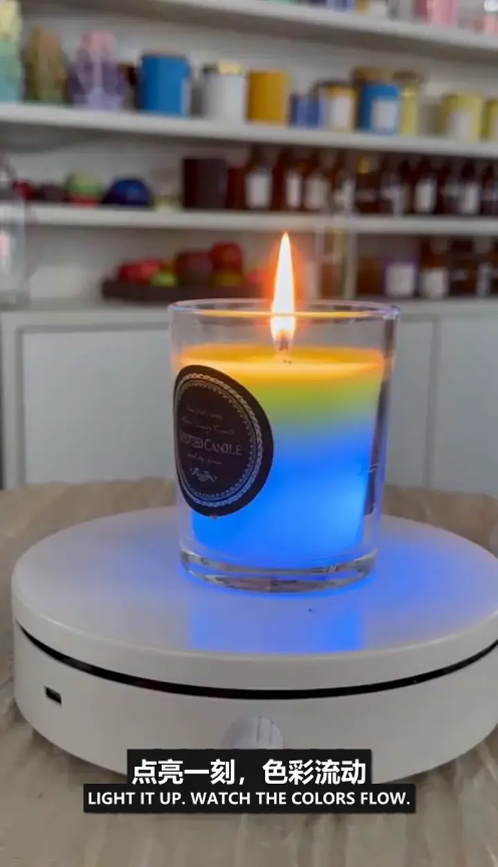 140g seven-color soy candle lit with flowing blue and green color